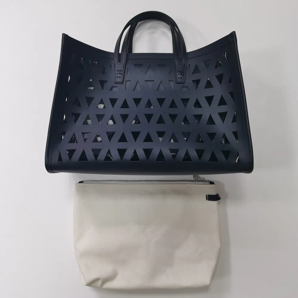 Black Laser-Cut Handbag with Removable Pouch for Modern Daily Use