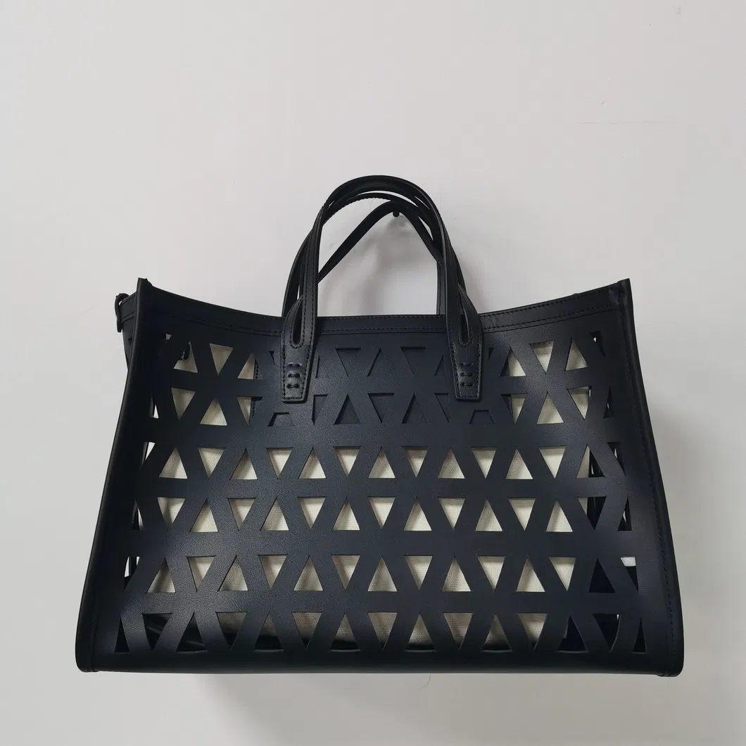 Black Laser-Cut Handbag with Removable Pouch for Modern Daily Use