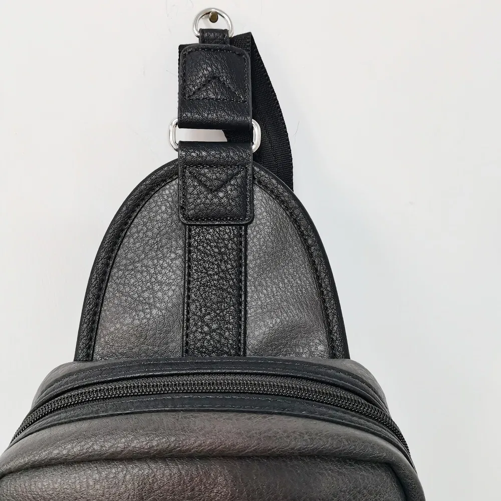 Compact Sports Sling Bag with Zippered Strap Pocket