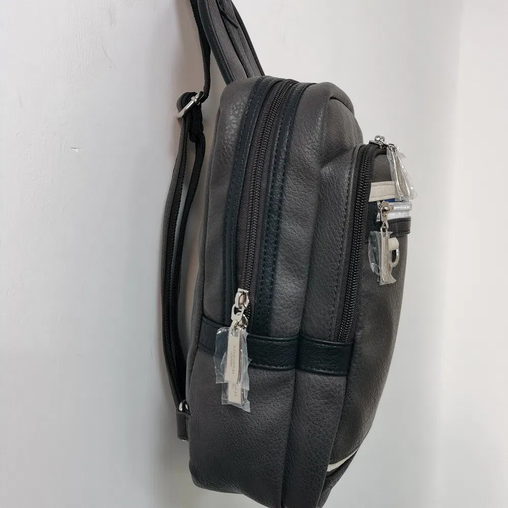 Compact Sports Sling Bag with Zippered Strap Pocket