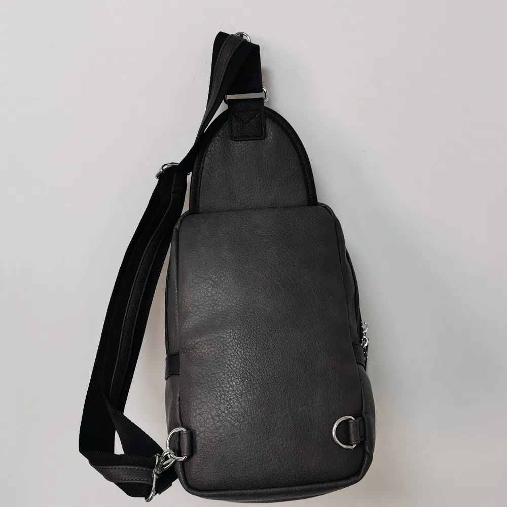 Compact Sports Sling Bag with Zippered Strap Pocket