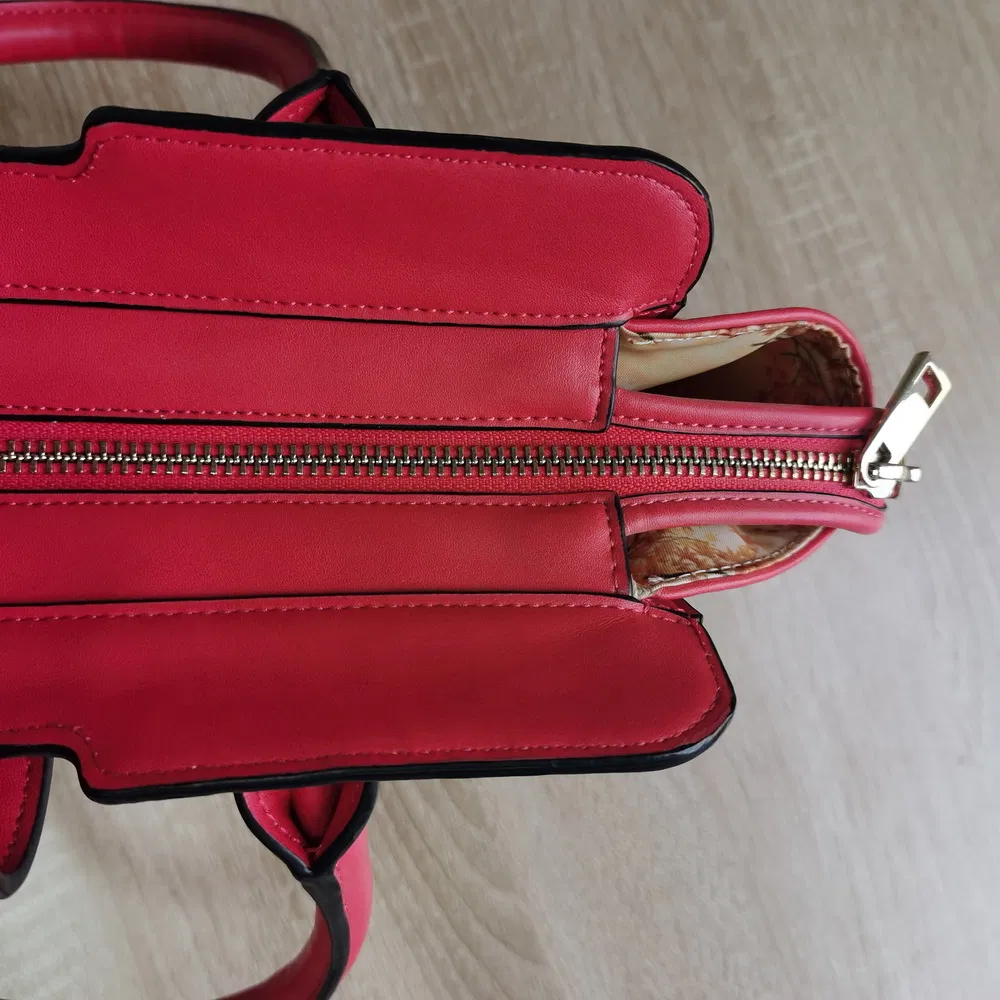 Crimson Structured Faux Leather Tote Handbag with Stud Base and Maple Lining