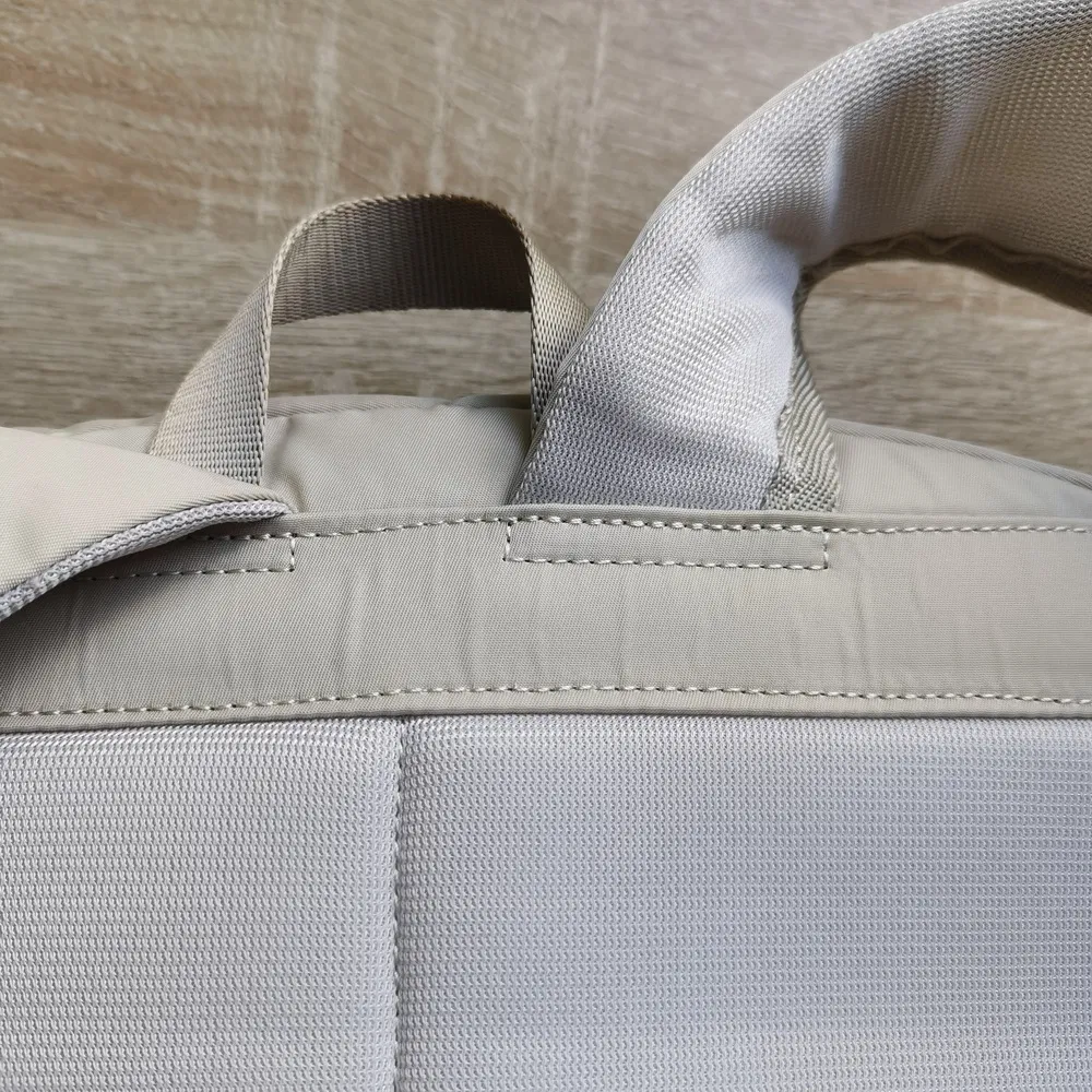 Multi-Compartment Nylon Tool Backpack with Slip Sleeves and Key Chain