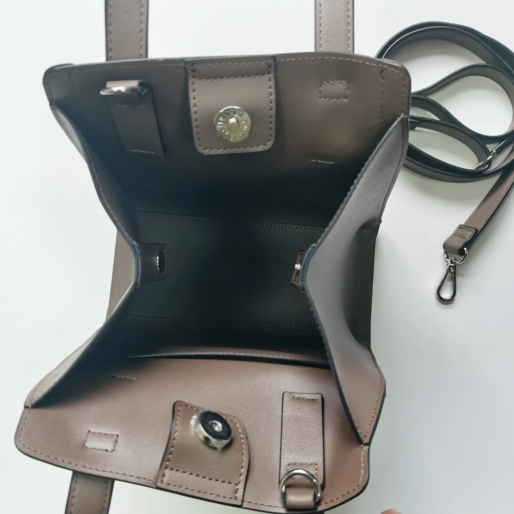 Taupe Structured Handbag with Detachable Strap for Elegant Daily Use